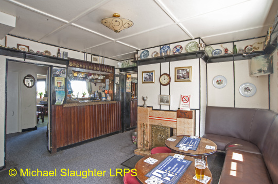 Front Left Bar.  by Michael Slaughter. Published on  