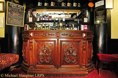 Carved bar Counter in Front Bar.  by Michael Slaughter. Published on 