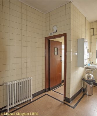 Tiling in Toilet.  by Michael Slaughter. Published on 