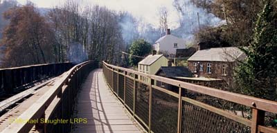 Exterior and Footbridge.  by Michael Slaughter. Published on 